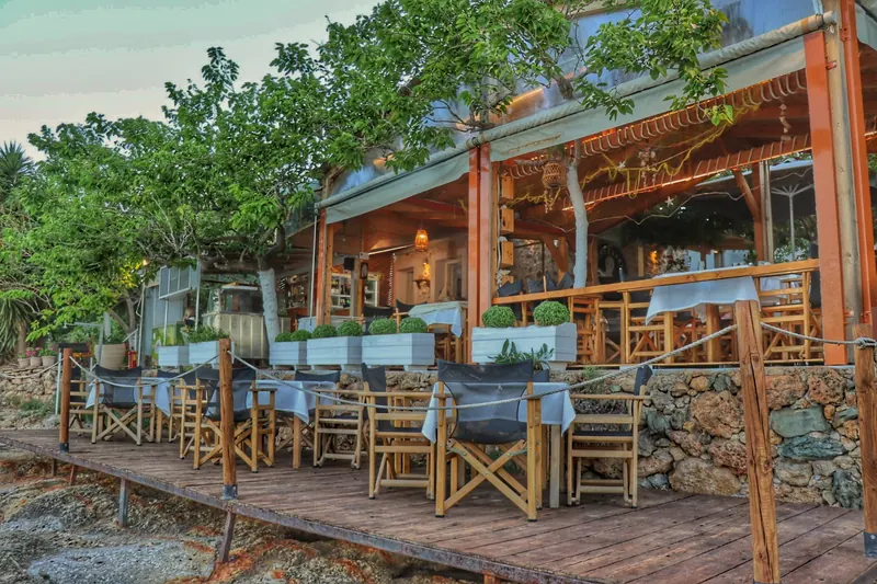 Outdoor deck dining — Xtapodaki Seafood Restaurant, Karavostasi, Peloponnese